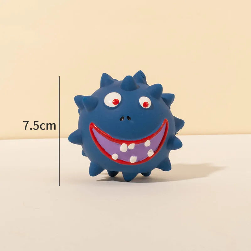 Four colourful squeaky dog balls with cute faces on natural latex rubber with bumpy dental-cleaning surface