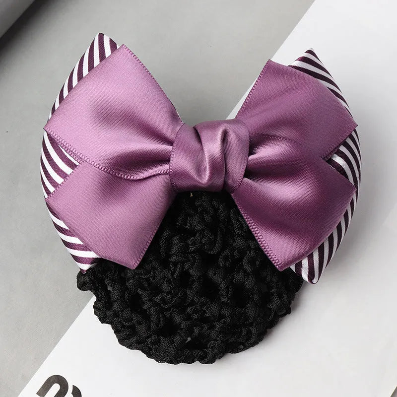 Professional flower bow headdress hair clip ornament on a work plate, shown in a selection of net and mesh colour variations.