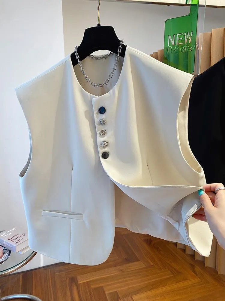 Women's loose-fitting beige polyester waistcoat vest with pockets on a hanger.