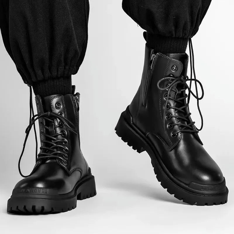 Men's black mid-top Tide British leather boots with a flat rubber sole on a neutral background.