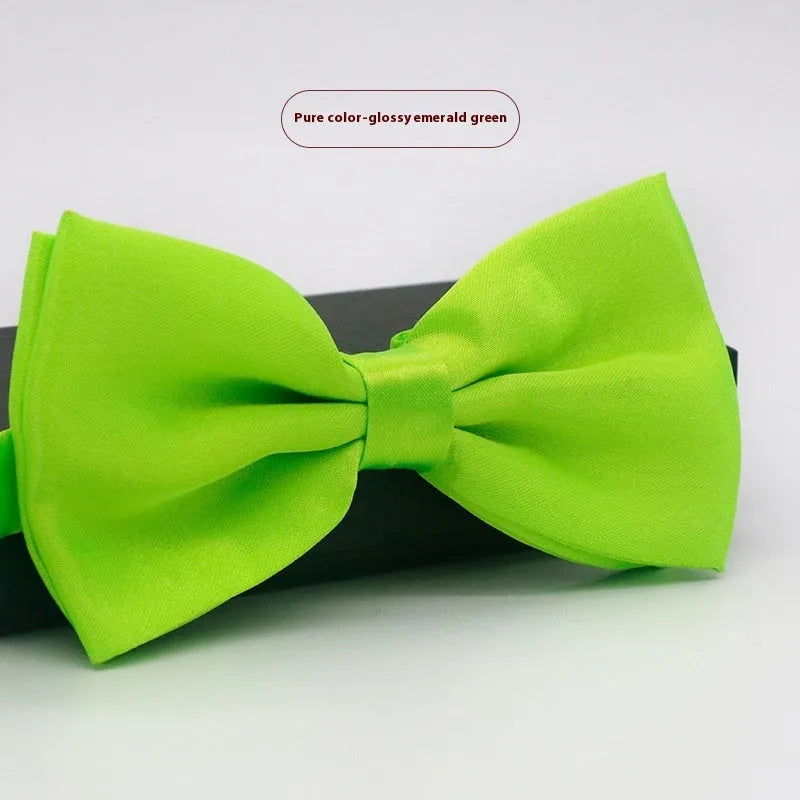 Men's flat head solid colour bow tie in polyester, showing 12cm by 6cm size on a background.