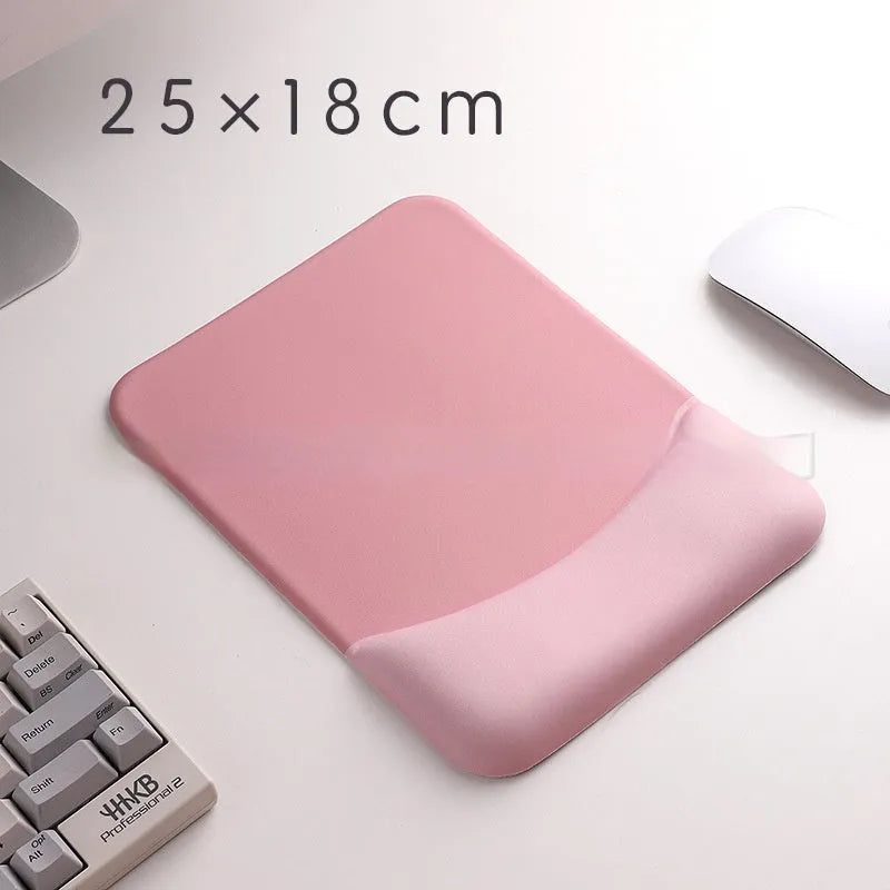 Square black silica gel wrist rest mouse pad with cloth surface on a desk.