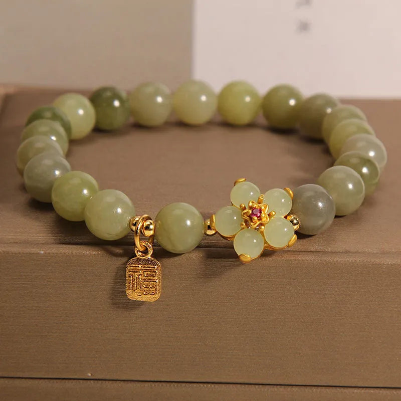 Women's casual alloy bracelet with grey jade stone accent on wrist