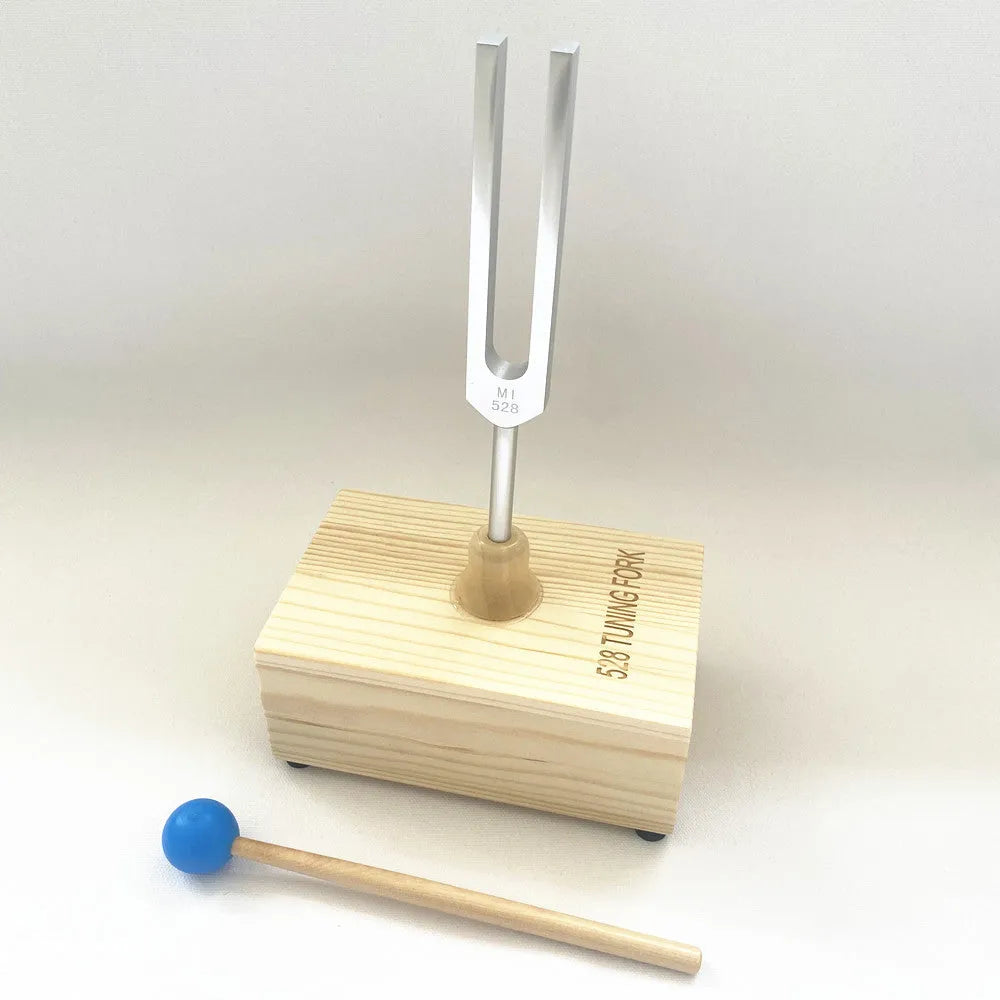 Aluminium alloy 432Hz tuning fork and portable speaker set in kraft paper box.