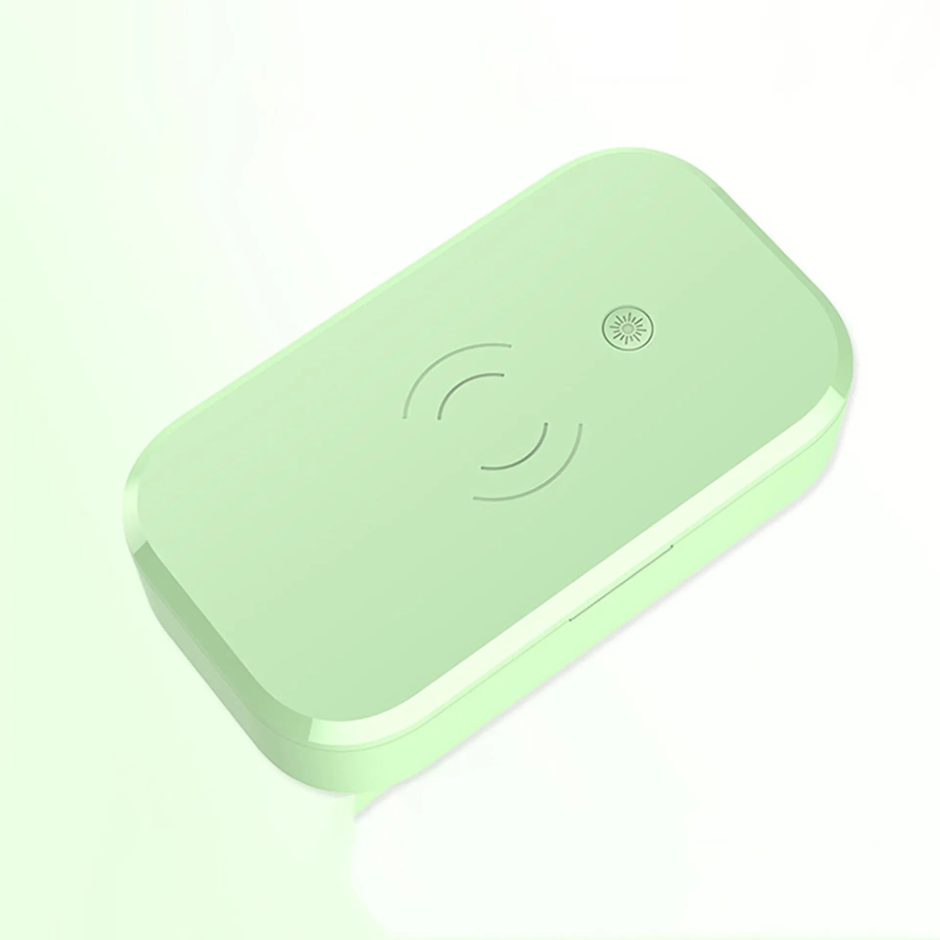 White ultraviolet disinfection box with wireless charging pad for nail tools and mobile phones