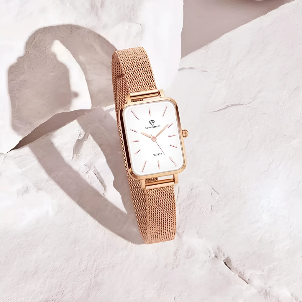 Women's rose gold waterproof quartz watch with woven steel strap and alloy case