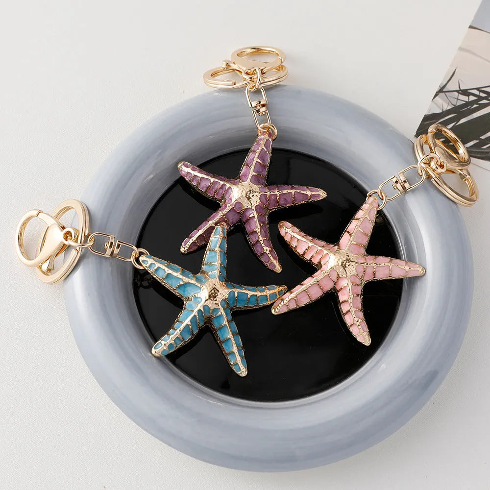 Ocean Series starfish keychain with electroplating finish in blue colour for luggage decoration