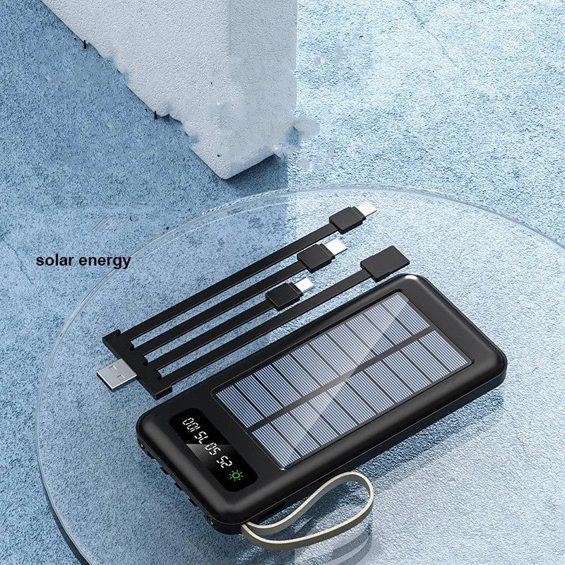 Black and white solar power bank showing its built-in solar panel and USB port.