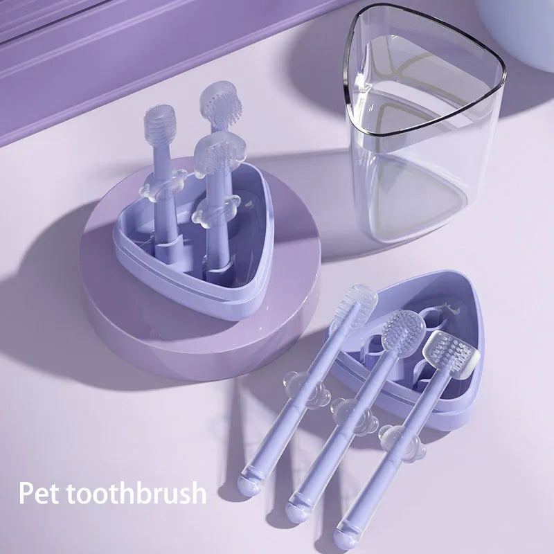 Soft silicone pet toothbrush for dogs and cats in purple, shown with flexible gel bristles for teeth cleaning.
