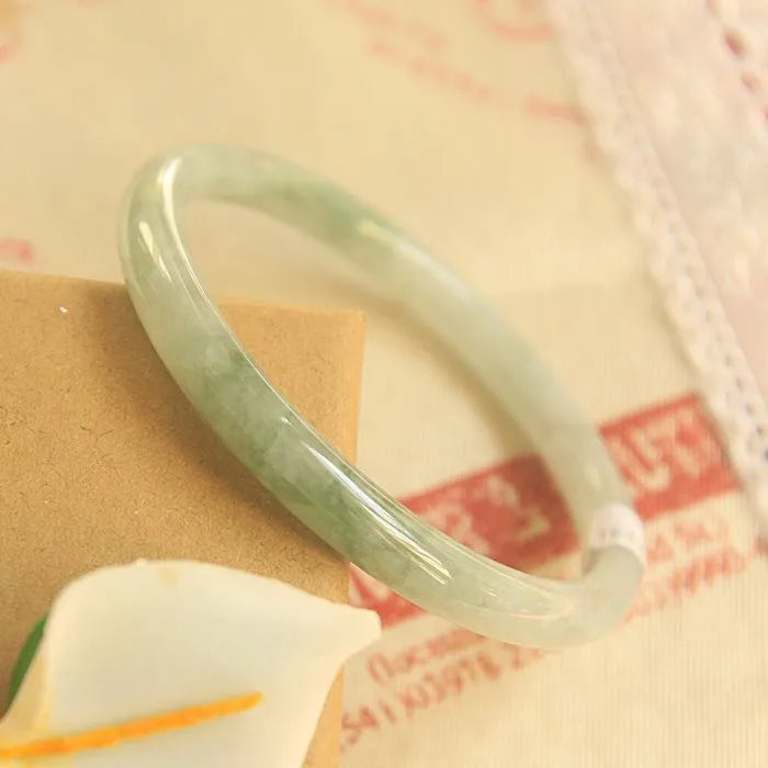 Green jade waxy geometric bracelet with 10mm beads and adjustable 53-64mm sizing