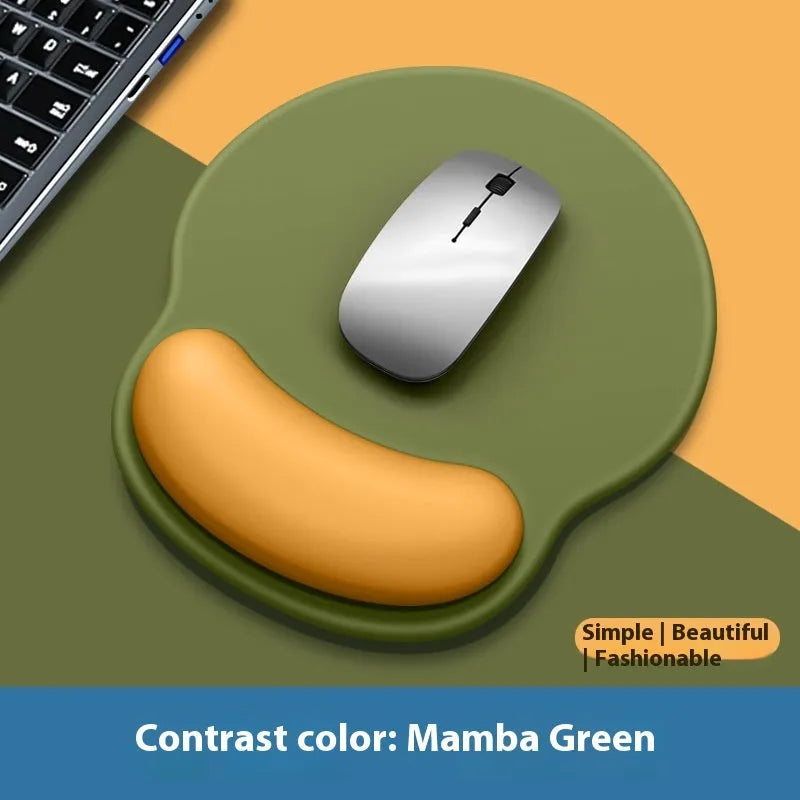 Silicone mouse mat with attached gel wrist support in a gradient blue colour on a desk.
