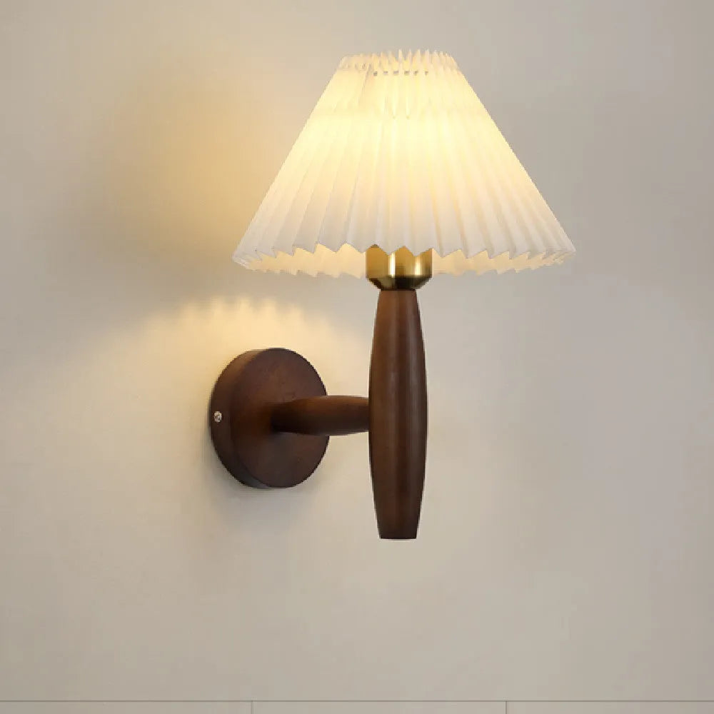 American retro walnut wood wall lamp with fabric shade in bedside setting