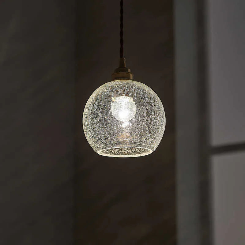 Compact brass-finished copper and glass ball chandelier ceiling light with three colour temperature options.