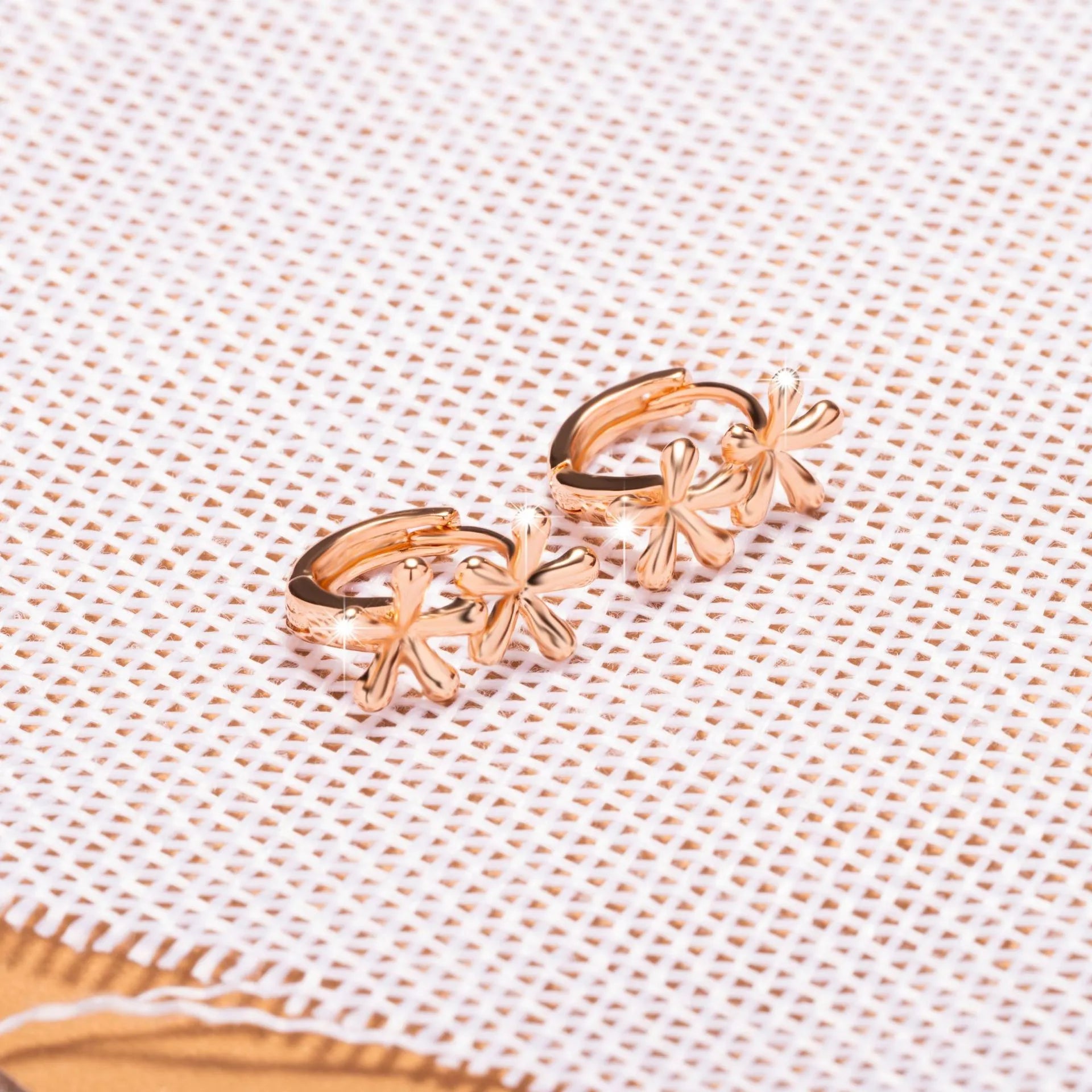 Women's rose gold waterdrop flower earrings with circular shape and electroplated finish