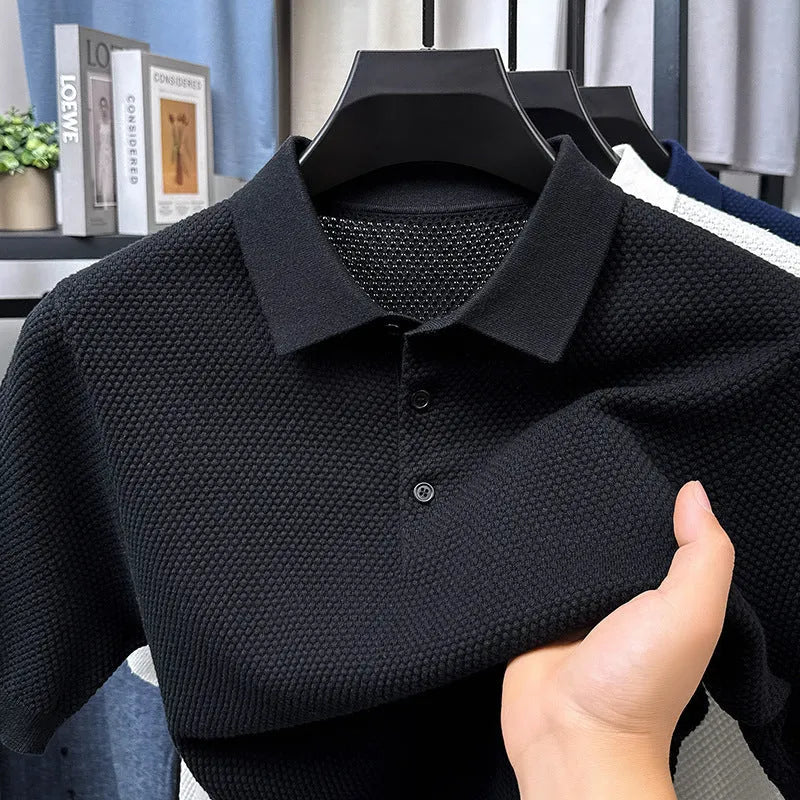 Loose fit pure cotton short sleeve pullover sweater in grey on a hanger.