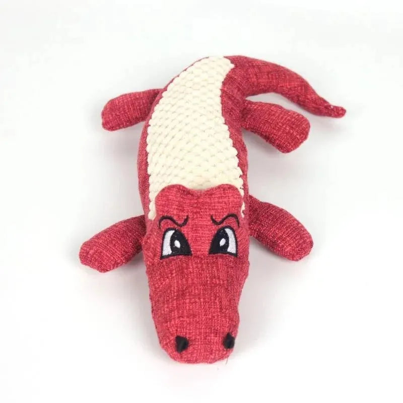Blue, green, and red corn cob shaped plush dog toy with a textured surface on a white background.