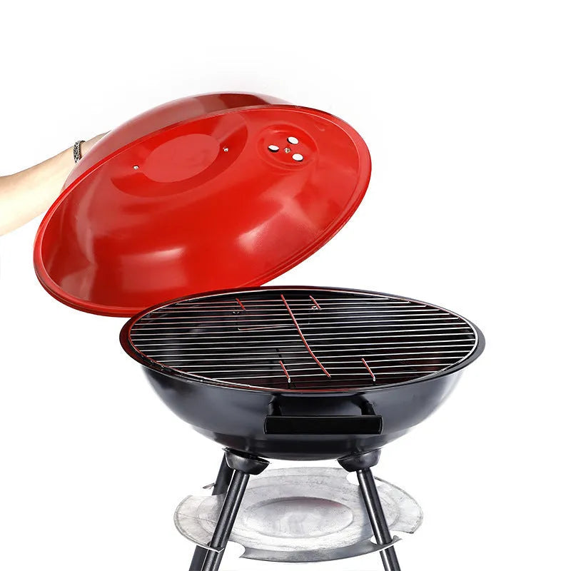 14-inch portable iron barbecue grill with modern minimalist design on a circular cooking surface