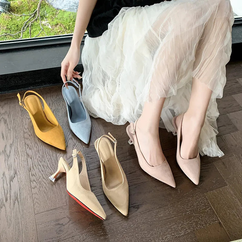 Pointed toe stiletto high heel shoe in suede with a rubber sole.