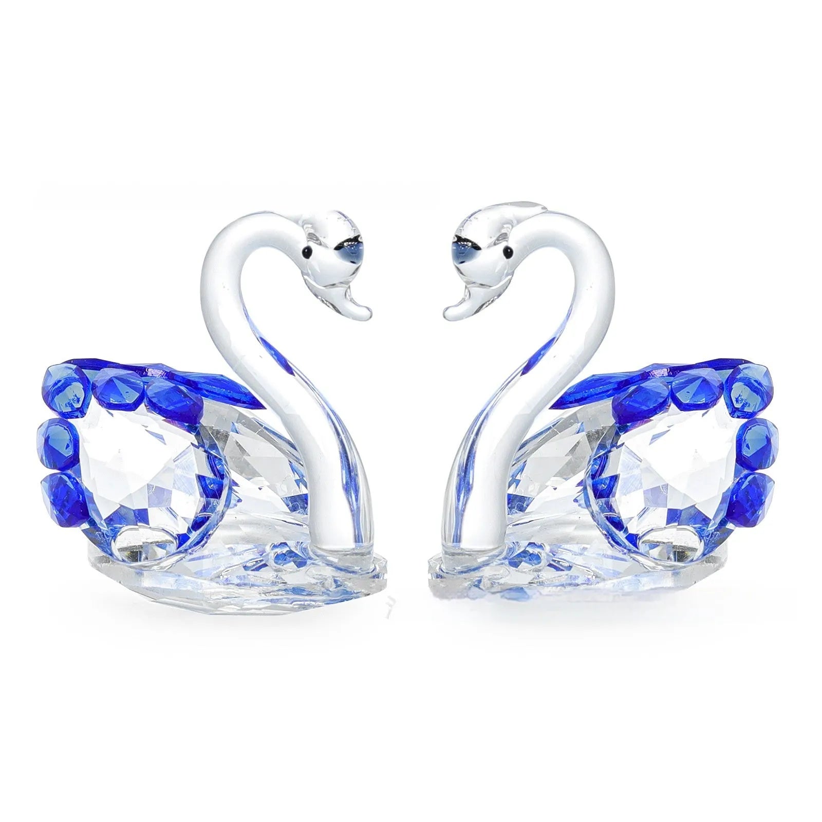 White crystal swan decoration on desktop with red, blue, pink, and violet colour options