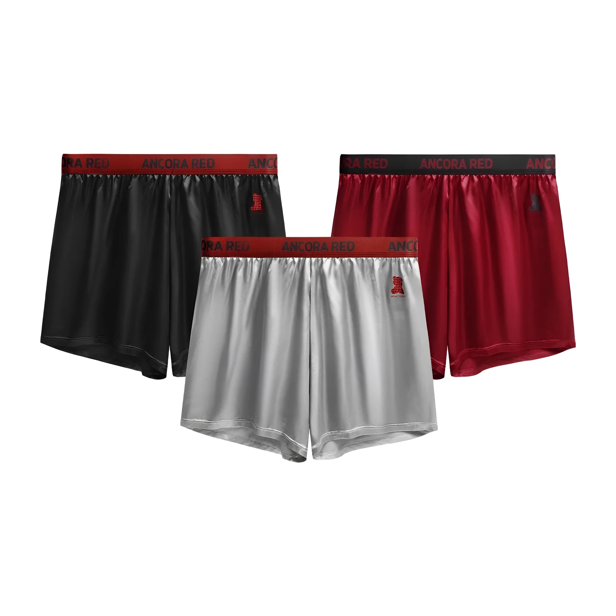 Solid colour men's boxer briefs on a mid-waist model, showing polyester knit fabric in black, blue, red, silver, purple and brown.