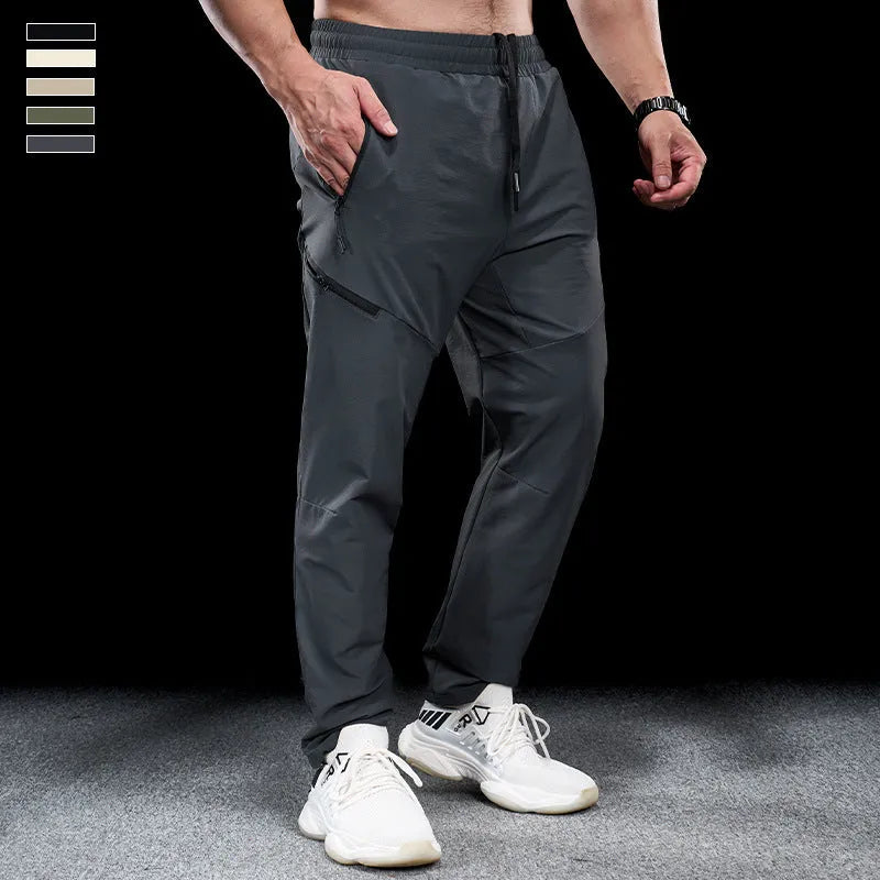 Men's waterproof quick-dry workout trousers in nylon fabric for sports and fitness