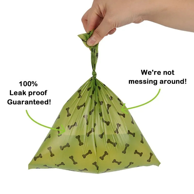 Roll of army green degradable dog poop bags with black bone print, showing bag size of 23x33cm.