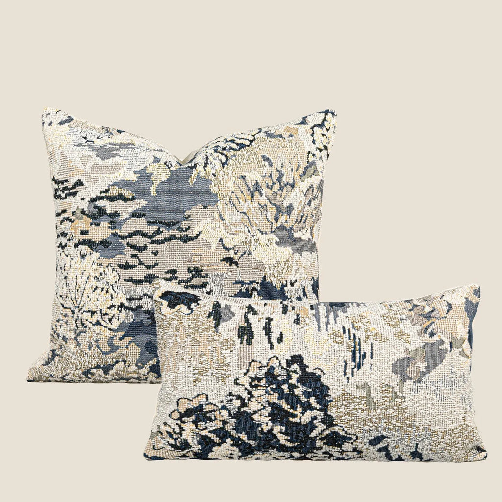 Antique blue floral patterned cushion in wool blend material showing French style design with feather velvet filler