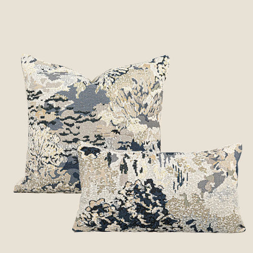 Antique blue floral patterned cushion in wool blend material showing French style design with feather velvet filler