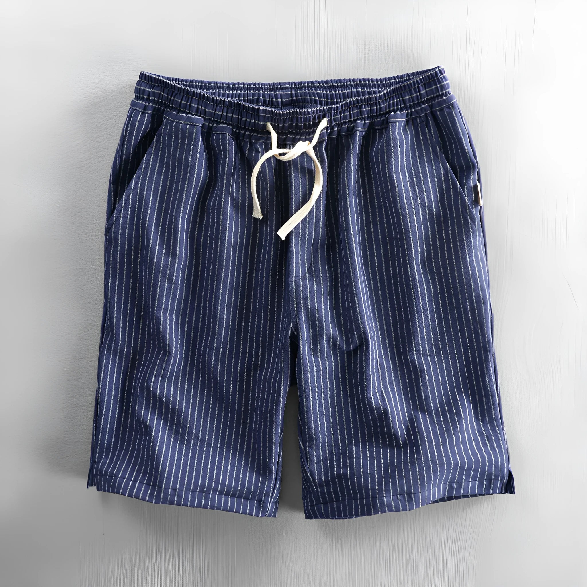 Men's striped cotton casual shorts showing straight-leg design and mid-waist fit
