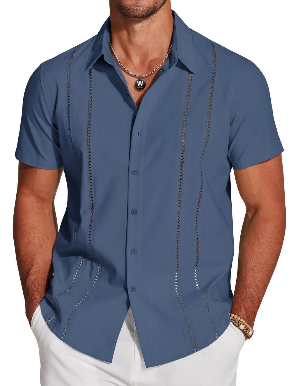 Man wearing a slim fit, short sleeve Hawaiian shirt with a digital print pattern in a casual setting.