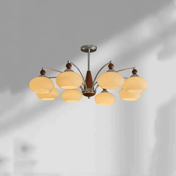 Persimmon glass and chrome chandelier with multiple lampshades in a Middle Ancient style