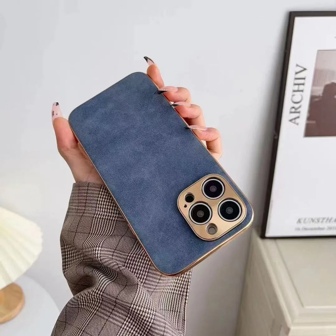 Leather texture TPU phone case for iPhone in solid black, blue, grey, and grey-green colours.