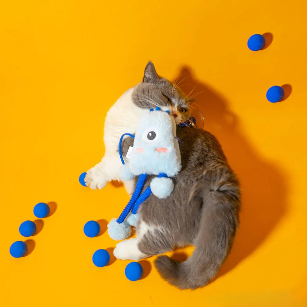 Blue telescopic elastic cat toy with plush ring and mint bell attachment on elastic rope