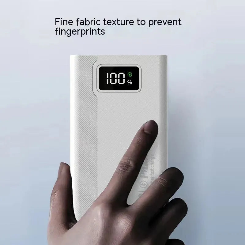 Large capacity power bank in black or white plastic housing with dimensions from 150×76×30mm to 150×76×50mm
