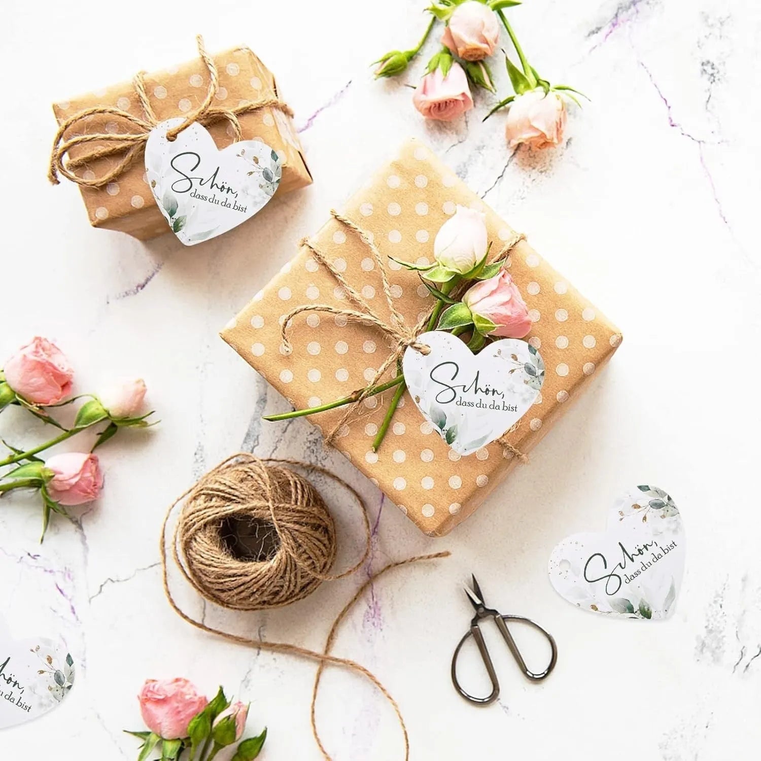 Set of 50 flower heart-shaped paper gift tags in two colour variations for weddings and birthdays