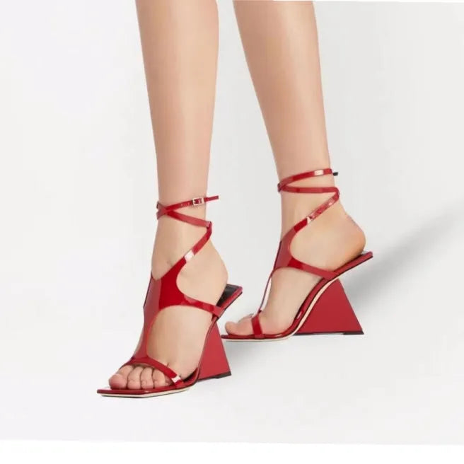 Women's black high heel sandals with a square toe and adjustable ankle buckle on a 9.5cm block heel.