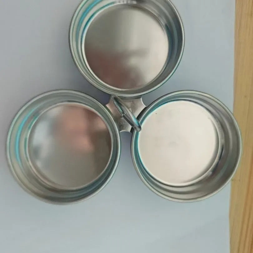 Stainless steel mini egg steamer in heart-shaped and round designs for boiling and stewing eggs.