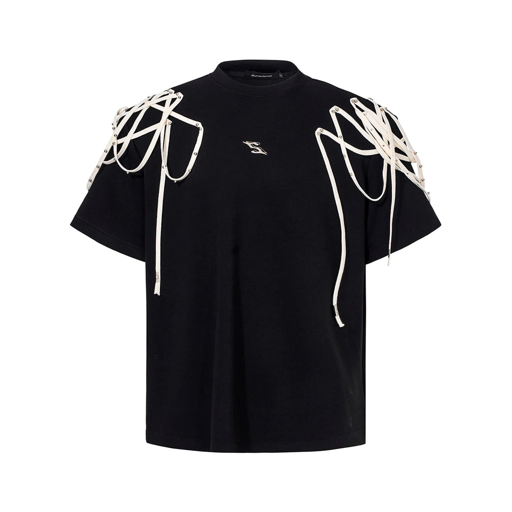 Black loose fit T-shirt with padded shoulders and decorative rivet ribbon detail on a short sleeve.