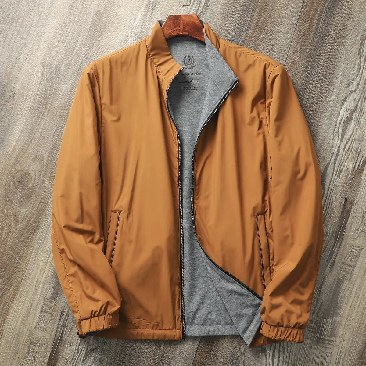 Men's stand collar simple jacket in a polyester blend fabric shown in Army Green colour.