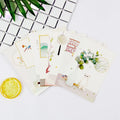Japanese style postcard set with minimalist cartoon designs of retro Paris towers and historic sites