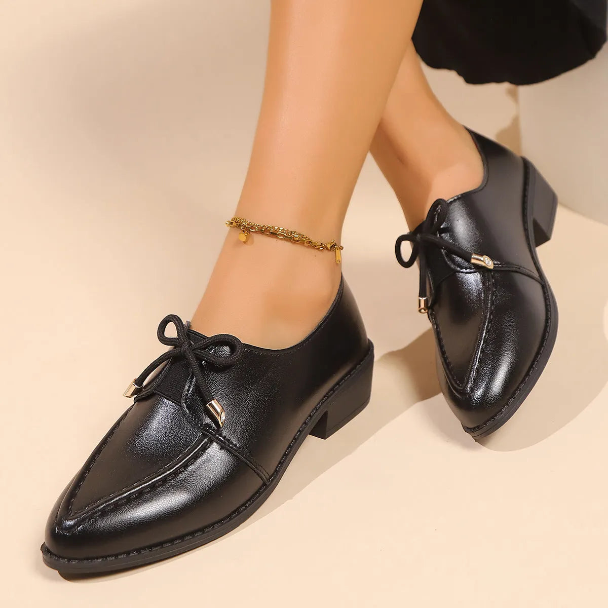 Women's leather-style shoes with bow decoration on PU upper and rubber sole