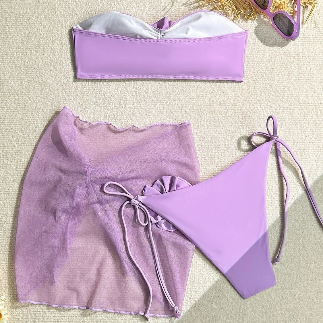 Women's tube top swimsuit with 3D flower detail in blue, pink, or purple colours