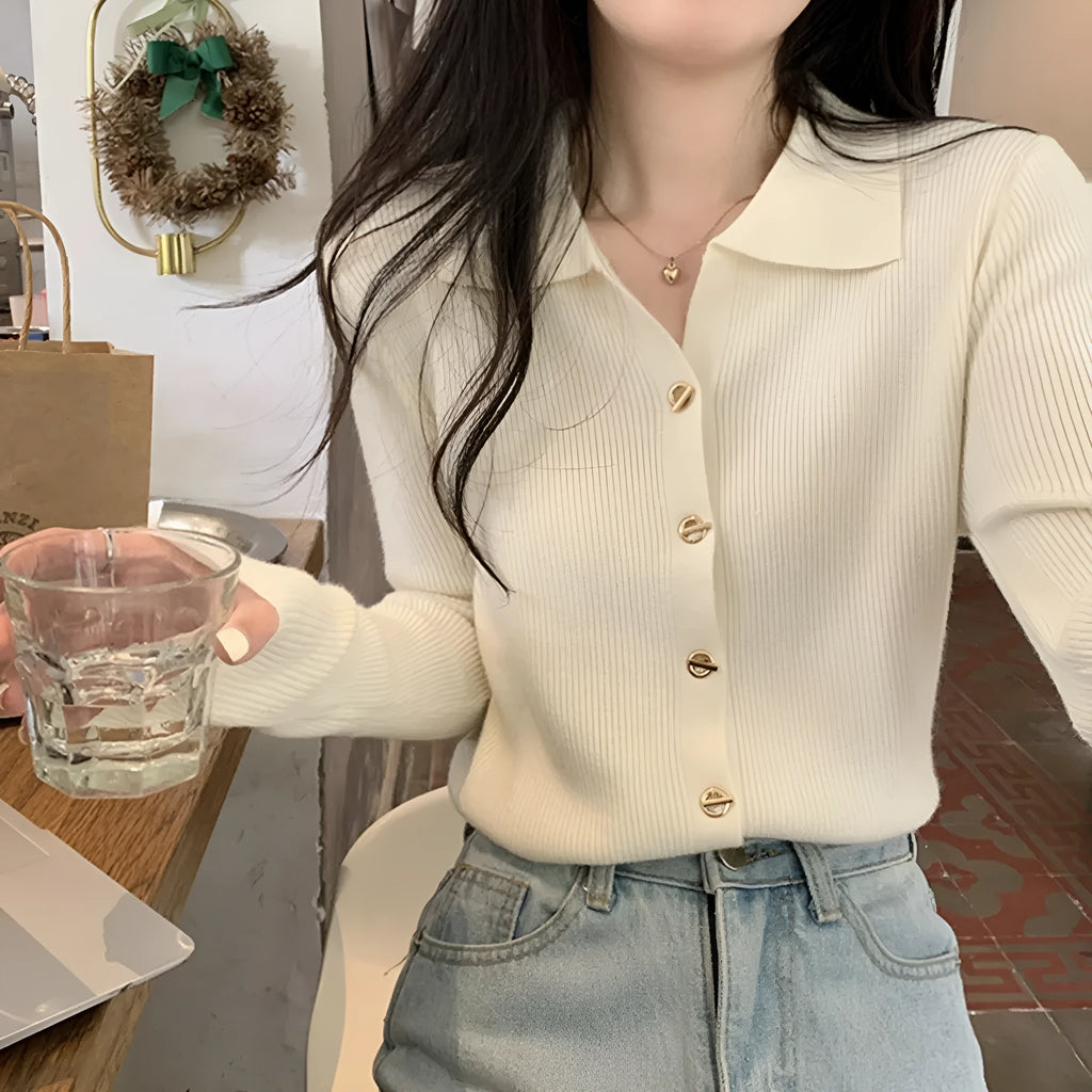 Long sleeved loose fit knitted cardigan top in viscose fibre, shown in beige colour.