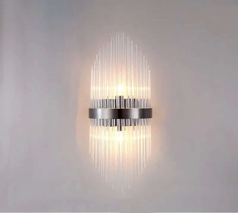 Modern petal-shaped crystal wall lamp with titanium finish in living room setting