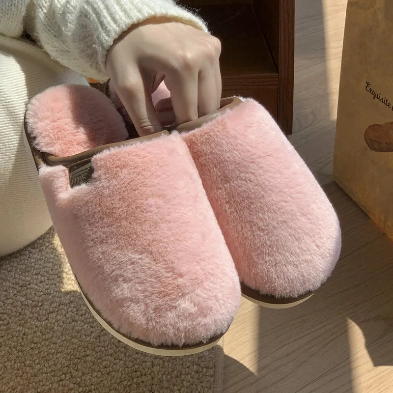 Solid colour winter plush slippers with PVC construction and non-slip sole