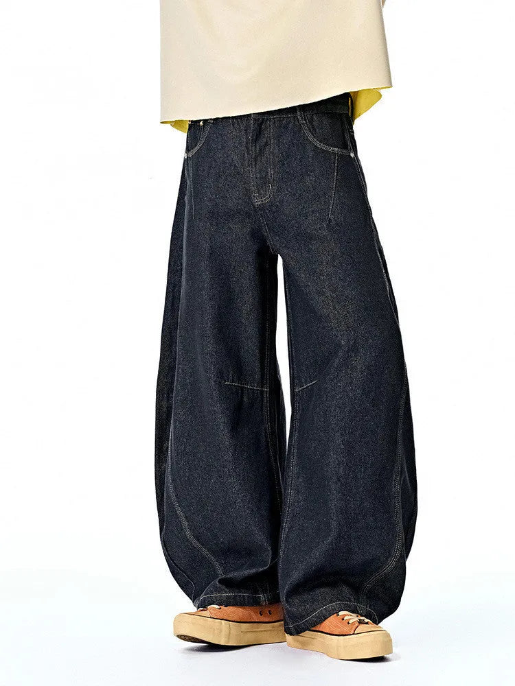 Men's wide leg denim trousers in original cow colour showing full length and relaxed fit