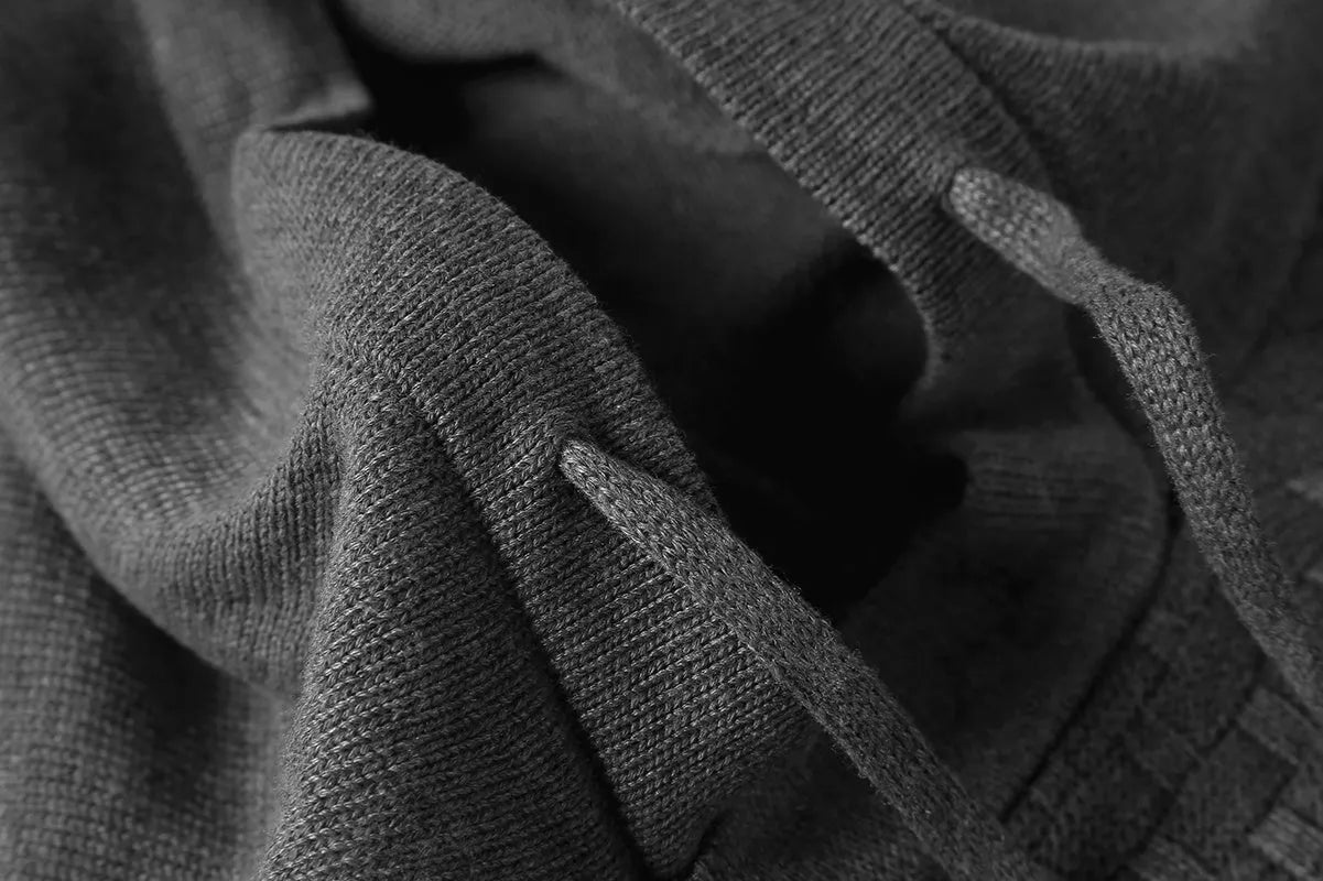 Men's black cotton-polyester blend hooded sweatshirt on a hanger.