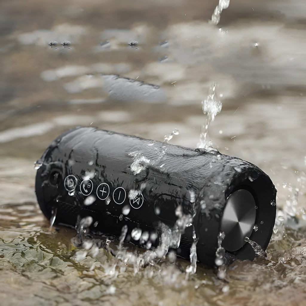 Waterproof portable outdoor Bluetooth speaker in black colour with buttons for playback and connectivity options.