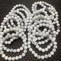 Natural white turquoise single circle bracelet with 8mm beads on a white background