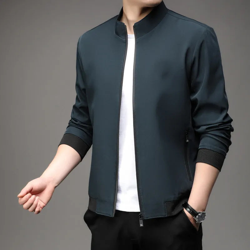 Korean style loose fit thin autumn jacket in blue with lapel collar and zip pockets.